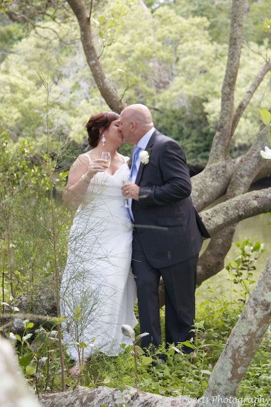 Bride and groom kissing - wedding photography sydney